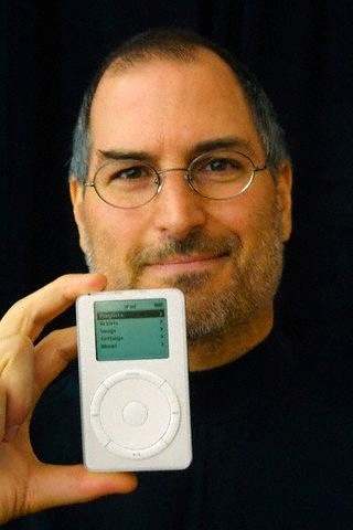 The iPod didn't seem real. 1,000 CD-quality songs into an ultra-portable, 6.5 ounce design that fits in your pocket. With the first iPod introduction in 2001, Apple would ring the death knell for CDs and set the standard for music players, which continues to this day. Designed by Jonathan Ive, the iPod was created in less than a year and the software development was overseen by Jobs himself.