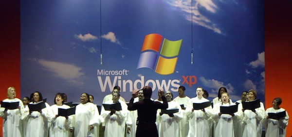 Choir sings "America the Beautiful" during Windows XP's launch. The song had renewed meaning for many, following terrorist attacks against the World Trade Center and US Pentagon the previous month. [Nate Mook]