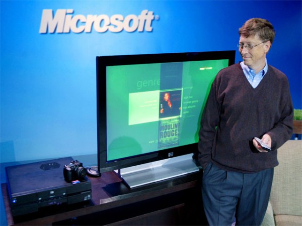 About six weeks after Windows XP launched, Bill Gates debuted a second, media-oriented user interface codename "Freestyle".  The first Windows XP Media Center Edition PCs shipped for holiday 2002. Here Gates poses with MCE 2005, three years later. [Microsoft]