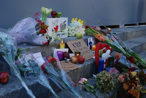 Flowers outside Apple's New York store commemorate Steve Jobs, who passed away Oct. 5, 2011. [Tim Conneally]