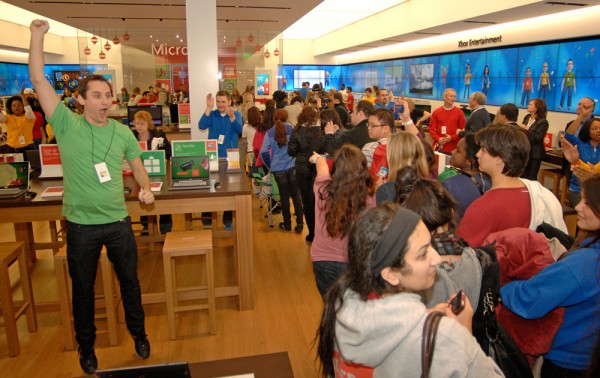 The first shoppers flood into Microsoft Store Tysons Corner. There is another draw. The first 1,000 people through the door get tickets for Joe Jonas concert on Nov. 19, 2011.