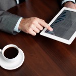 Businessman tablet reading coffee desk table touch Businessman tablet reading coffee desk table touch