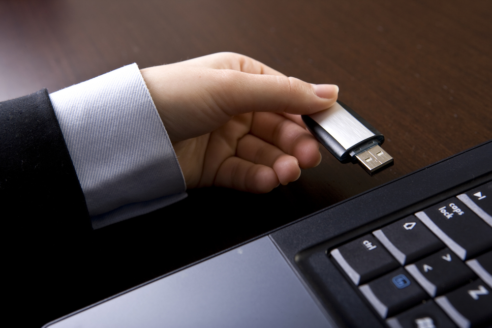 man hand usb flash laptop drive business suit