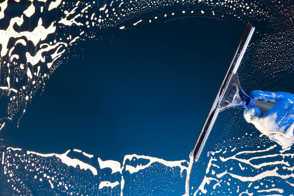 clean windshield soap water window