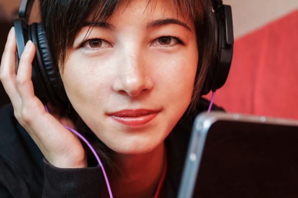 music woman tablet headphones