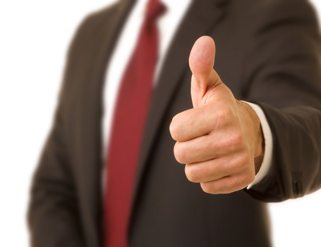 businessman thumbs up ok