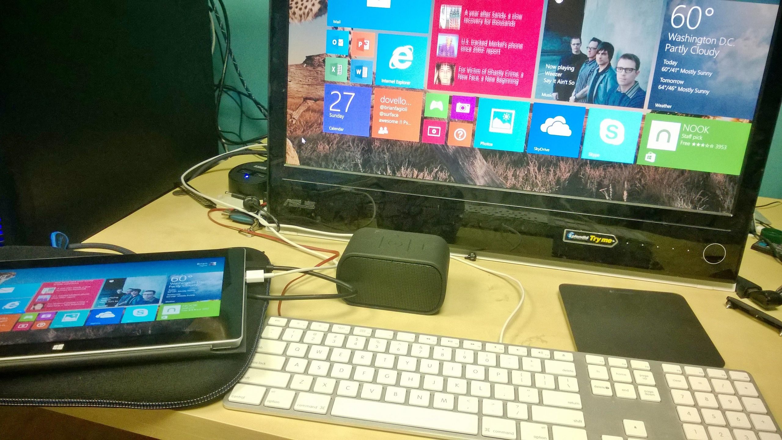 Microsoft surface 2 hooked to a 23 inch LCD,  apple keyboard, Logitech trackpad and bt speaker