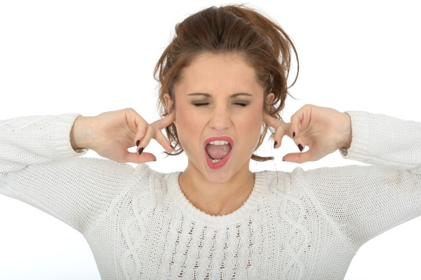 woman_with_fingers_in_ears