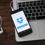 Dropbox Google LG Nexus 5 Android app MacBook Apple headphones table