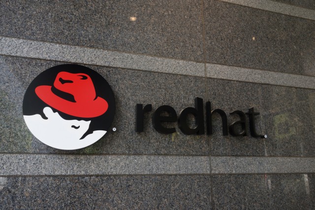 red hat logo sign