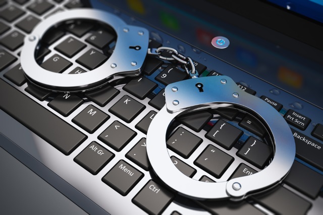 laptop-handcuffs