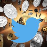 Twitter logo over cryptocurrency coins