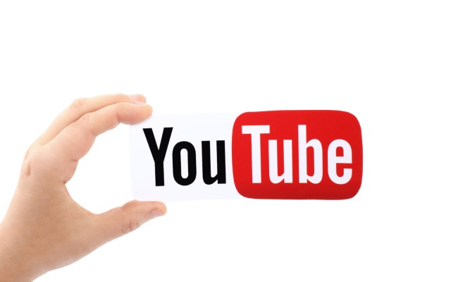 YouTube logo in hand