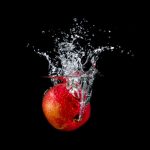 Apple dropped in water