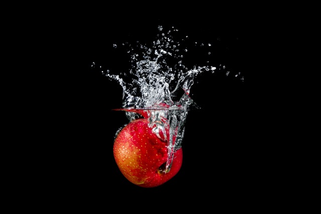 Apple dropped in water