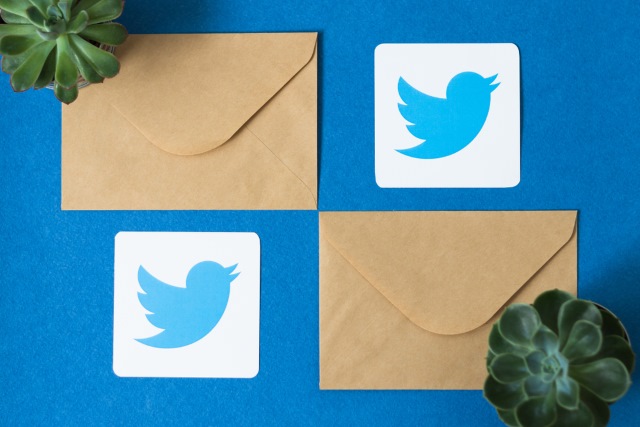 Twitter logo and envelopes