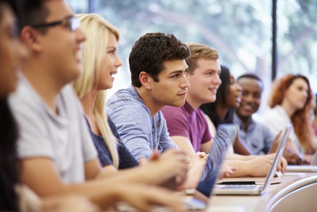 students with laptops