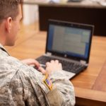 Soldier using laptop