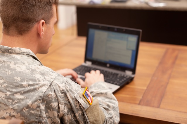 Soldier using laptop