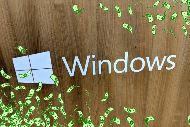 Windows on wood with dollars