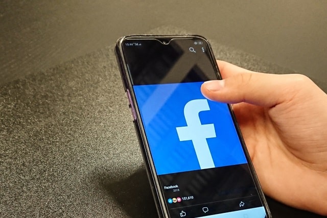 Facebook logo on mobile