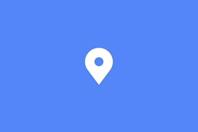 White location pin on a blue background