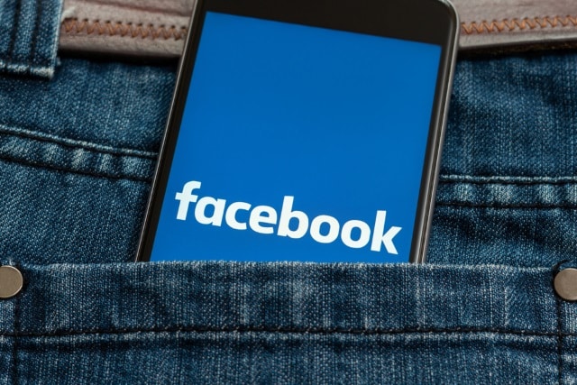 Facebook on mobile in pocket