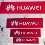 Four Huawei signs