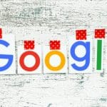 Google logo on white wood