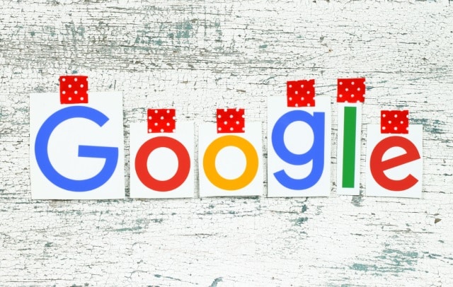 Google logo on white wood