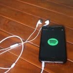 Spotify on phone with earphones