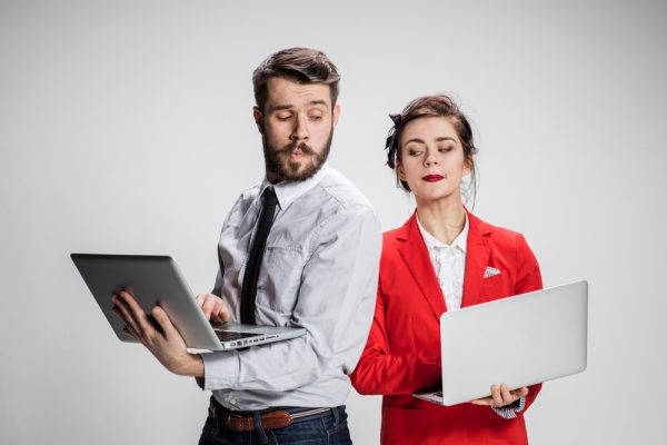 Couple with laptops