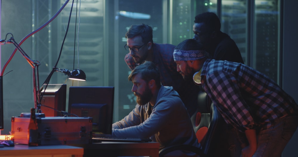 Hackers working at their desks