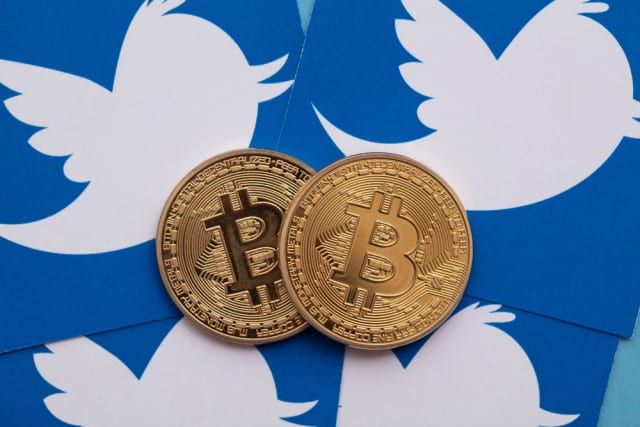 Twitter logo and Bitcoin