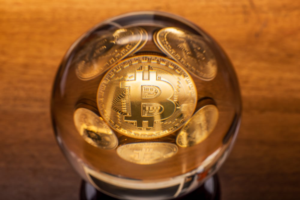 Bicoin coins in a crystal ball