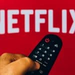 Netflix logo with remote