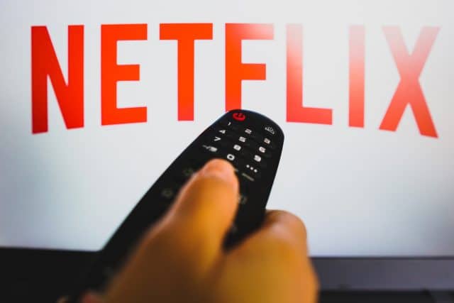 Netflix logo and remote control