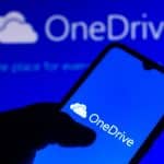 OneDrive logo with mobile in foreground