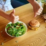 Thumbs up for salad, thumbs down for burger