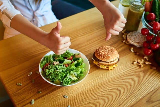Thumbs up for salad, thumbs down for burger