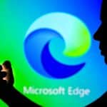 Blurry Microsoft Edge logo with mobile in foreground