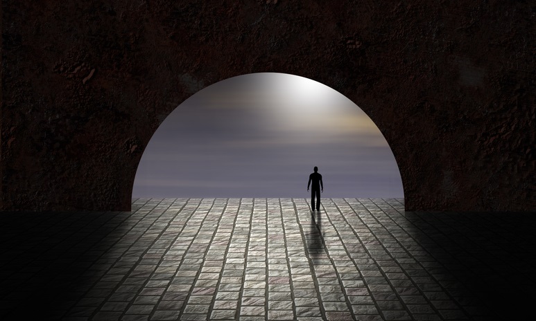 man stand stnding alone tunnel