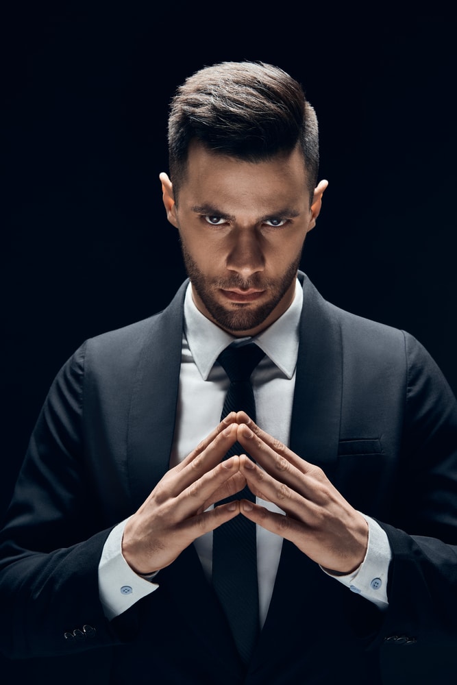 business man make sinister plans