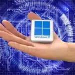 Hand holding a Windows 11 logo