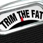 Weighing scales showing Trim The Fat message