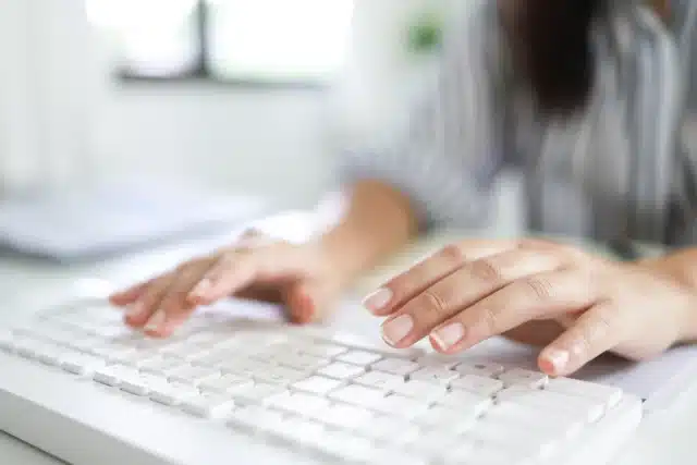 Woman using keyboard
