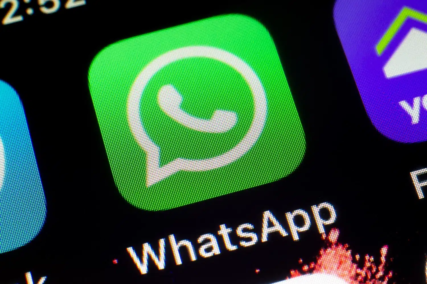 Close-up of WhatsApp app icon for security news