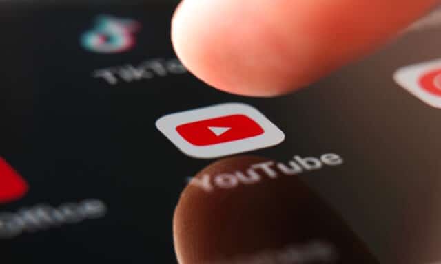 YouTube logo and finger