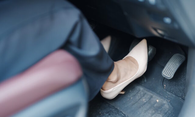Pressing brake pedal