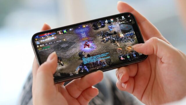 Person playing mobile RPG game